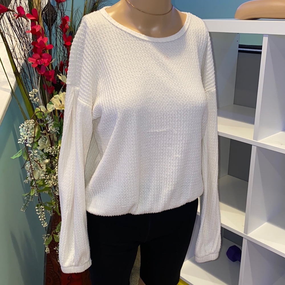 White waffle pattern sweater.